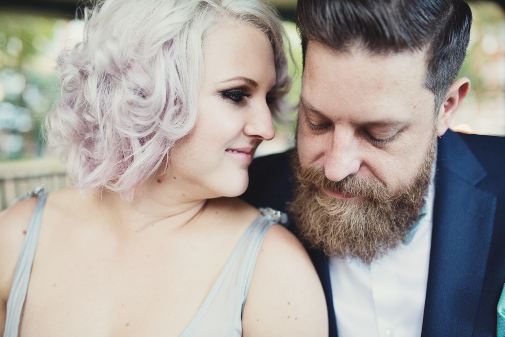 Pink haired bride and bearded groom