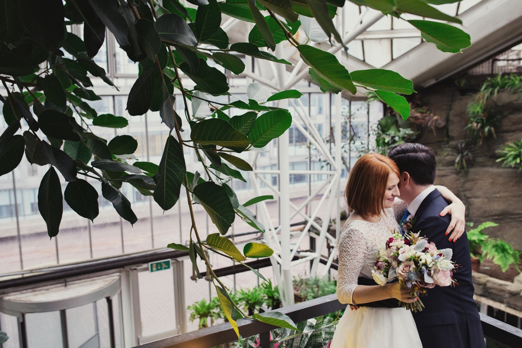 Fur Coat No Knickers bride with groom holding Petalon Flowers bouquet London