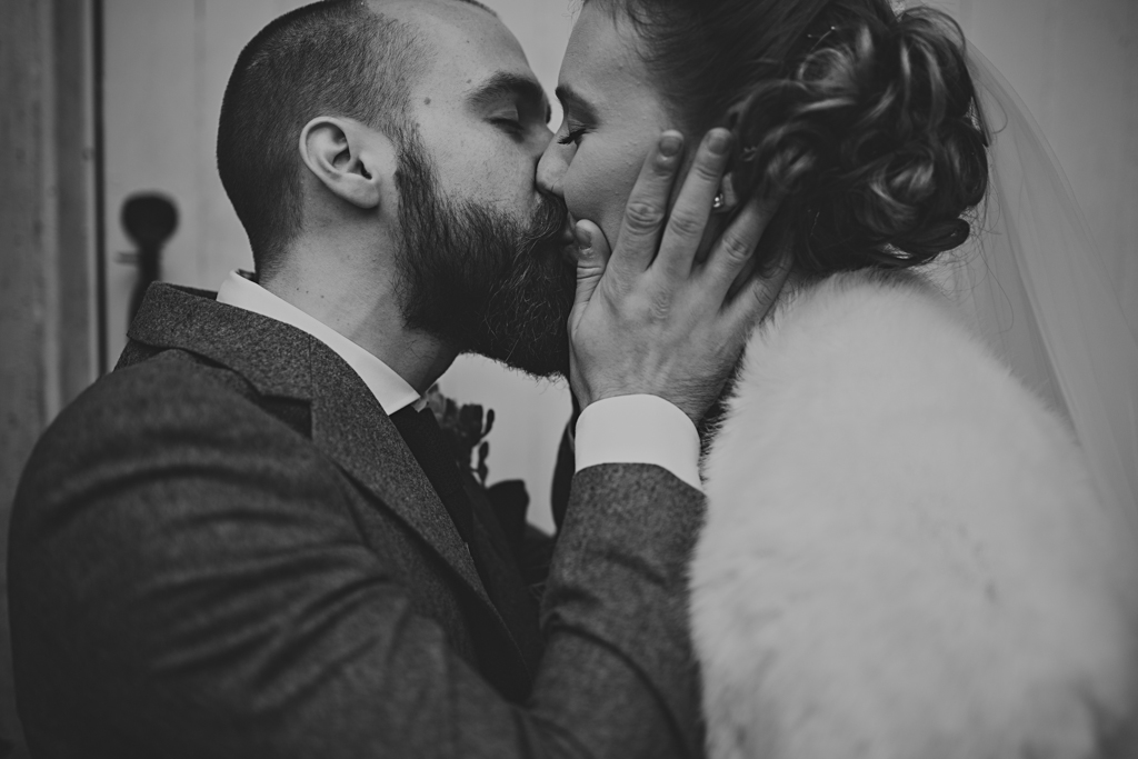Passionate kiss at a Northbrook Park wedding by Lisa Jane Photography 