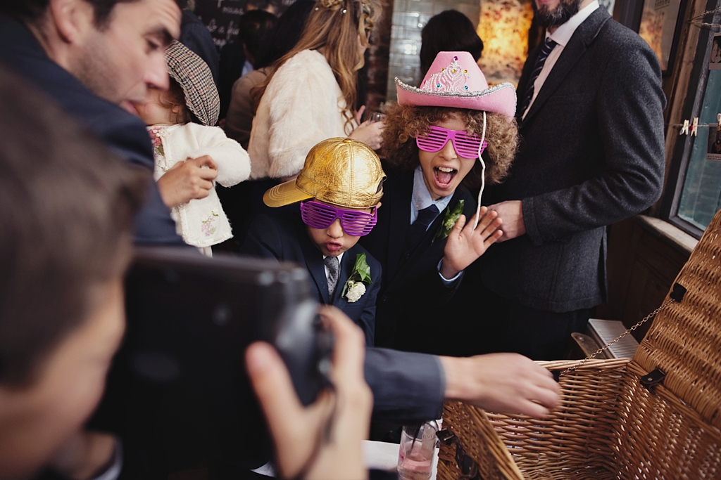 Fun dressing up at Hoxley and Porter pub wedding London