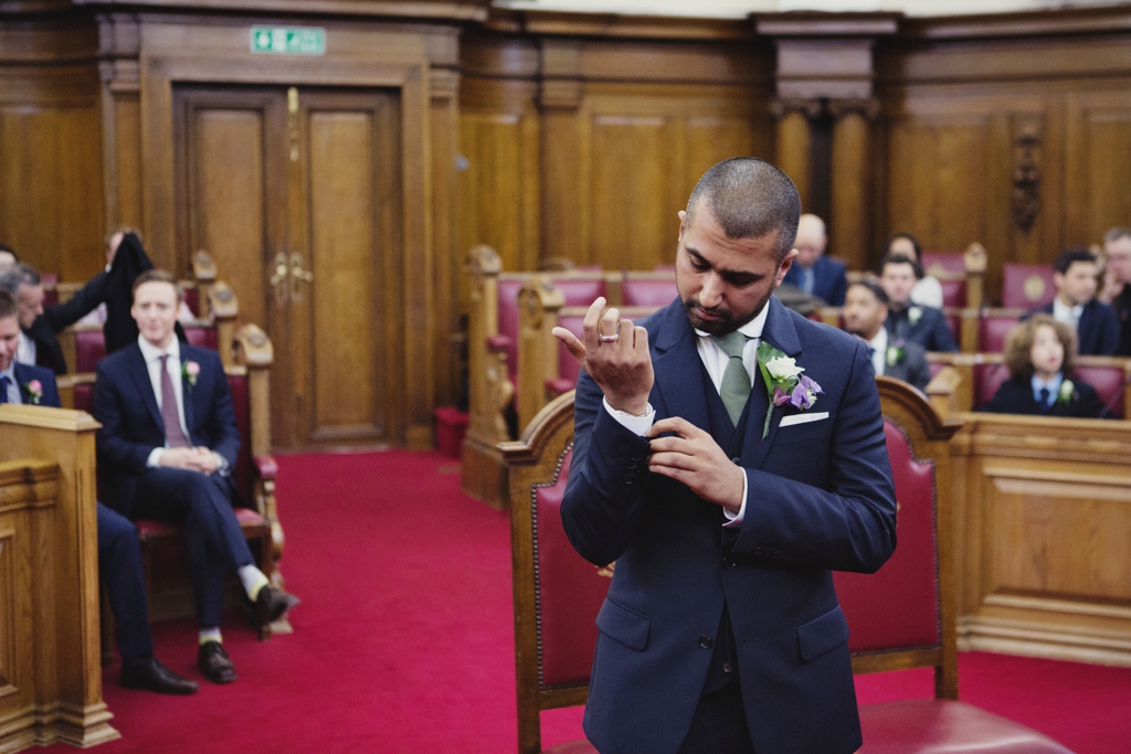 Groom awaits bride at Islington Town Hall London wedding
