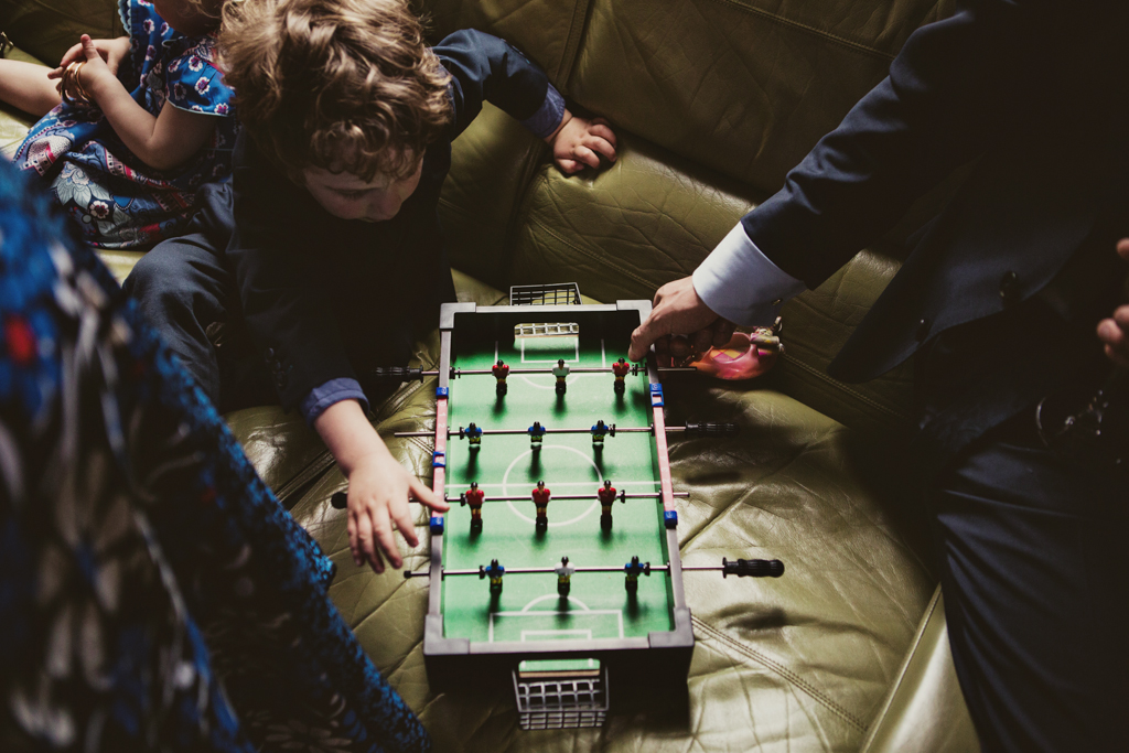 guests playing table football at a wedding in Hackney