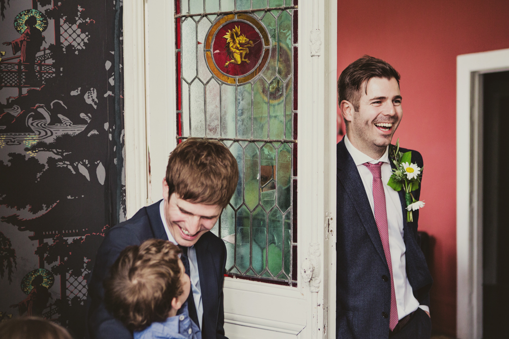 groom smiling at an east london wedding by Lisa Jane Photography