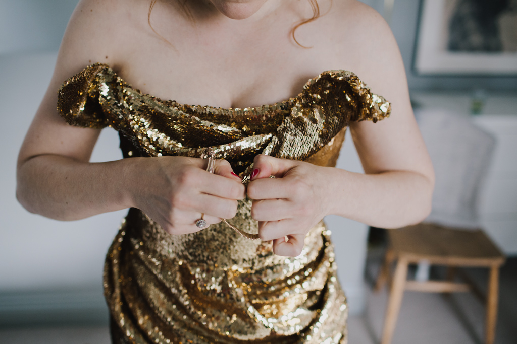 Bride putting on her jewellery | Lisa Jane Photography | Alternative London Wedding Photography