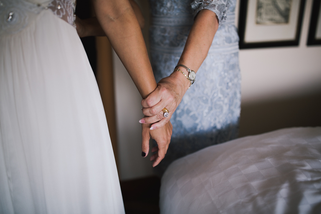 Mum holding brides hand at Wiltons Music Hall Wedding | Lisa Jane Photography | Creative London Wedding Photography