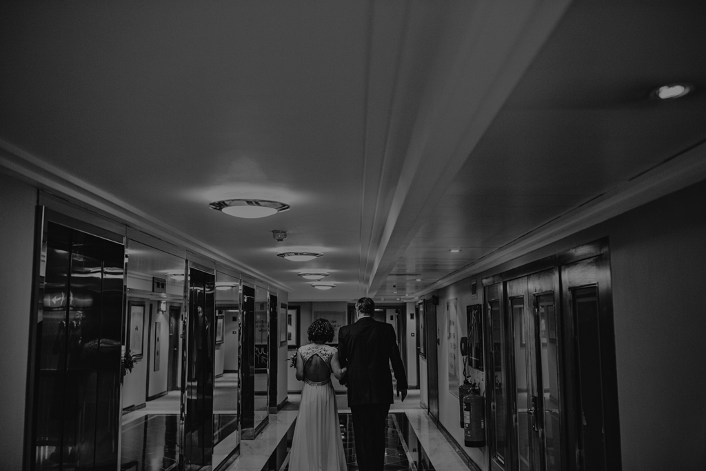 Bride walking with dad to wedding ceremony | Lisa Jane Photography | Wiltons Music Hall Wedding Photography
