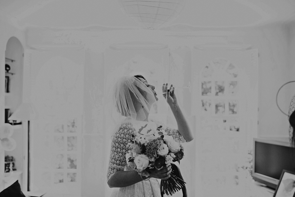 Bride taking a sip of champagne at Brighton Town Hall Wedding | Lisa Jane Photography | Creative Wedding Photography