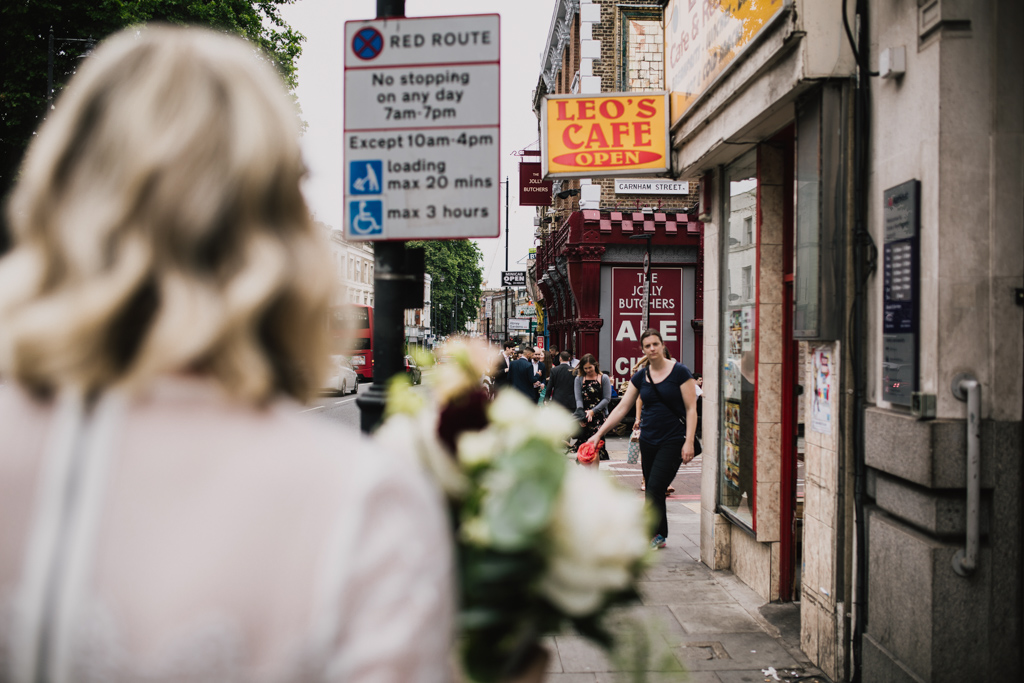 Bride outside The Jolly Butcher on Stoke Newington High Street | Lisa Jane Photography | Modern London Wedding Photography