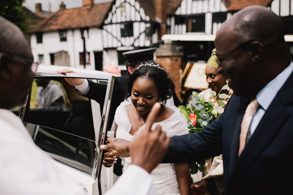 Bride getting out of car at London church wedding | Lisa Jane Photography | Modern Documentary Wedding Photography