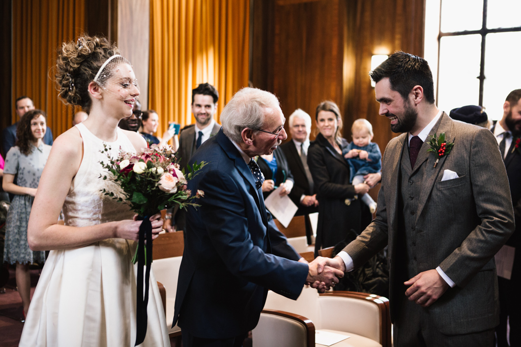 dad giving daughter away at a Stoke Newington Town Hall wedding | Lisa Jane Photography | Modern London Wedding Photography