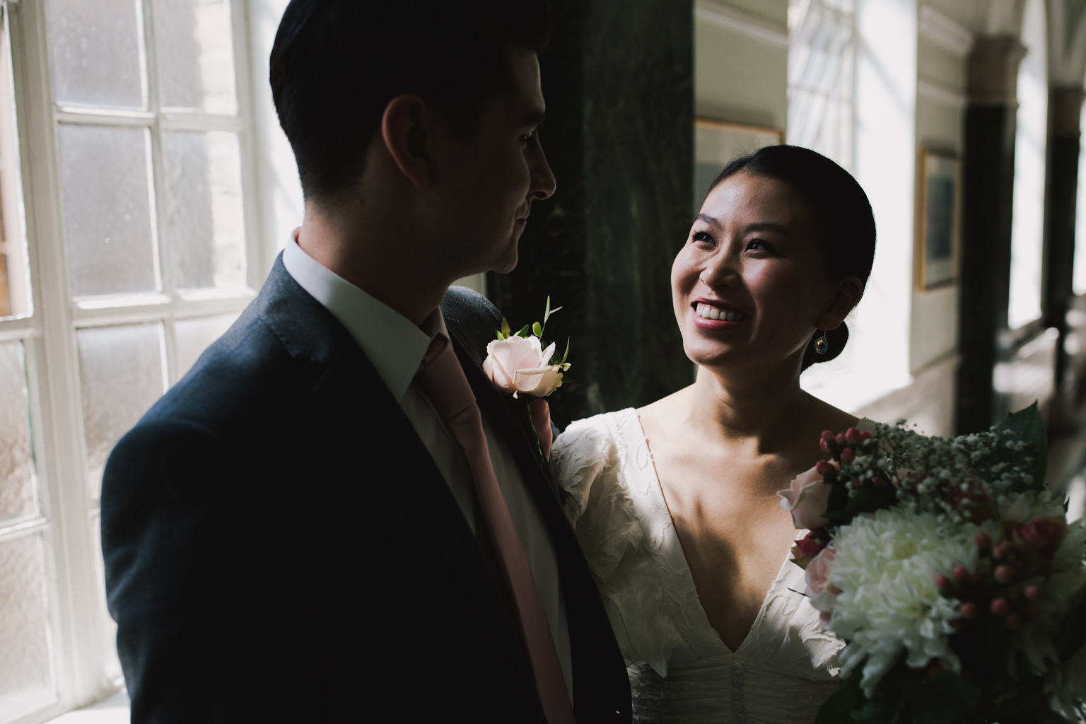 Bride and groom waiting to get married at an Islington Town Hall Elopement