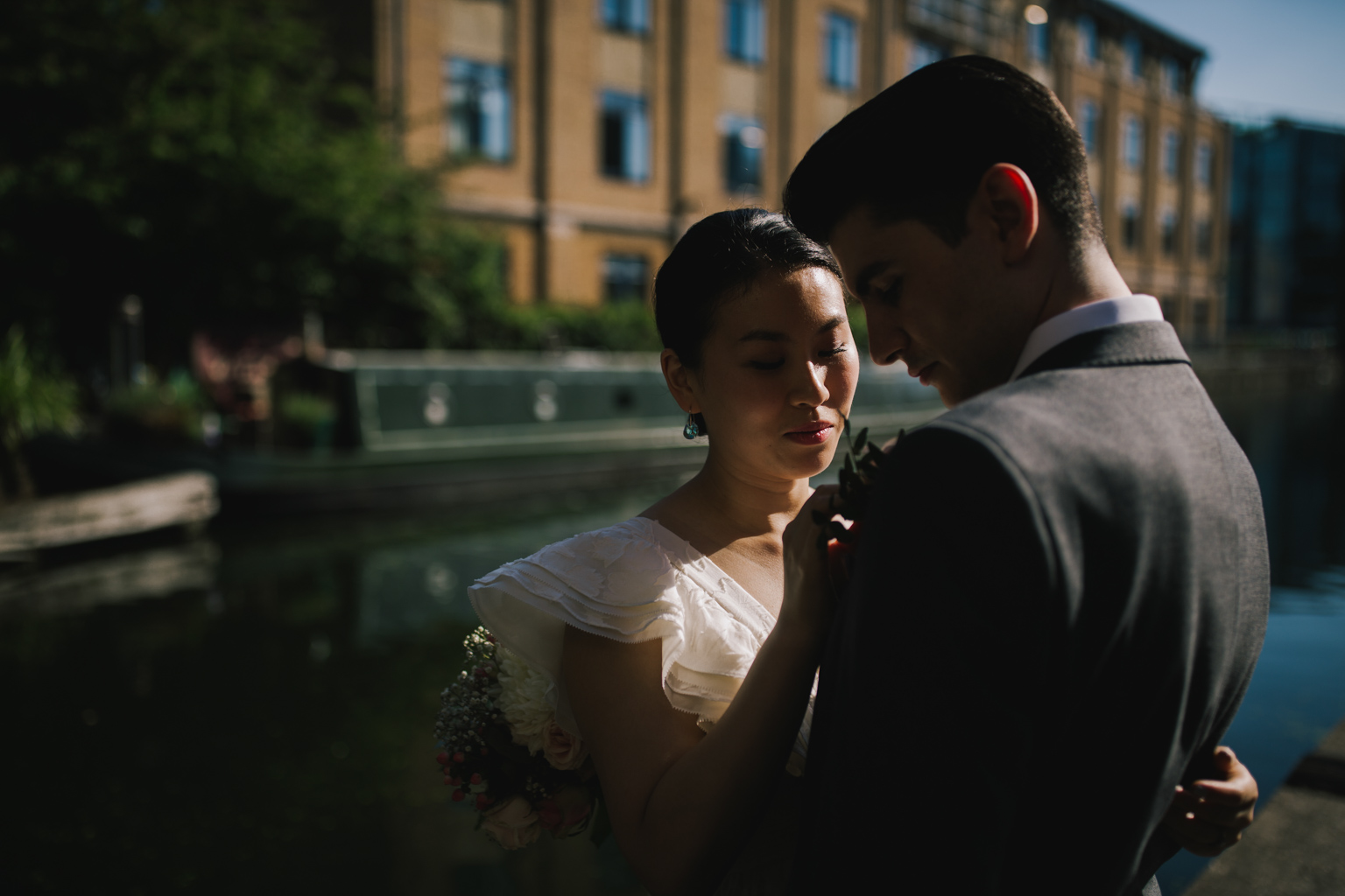Bride and groom portrait by the canal at Islington Town Hall Elopement