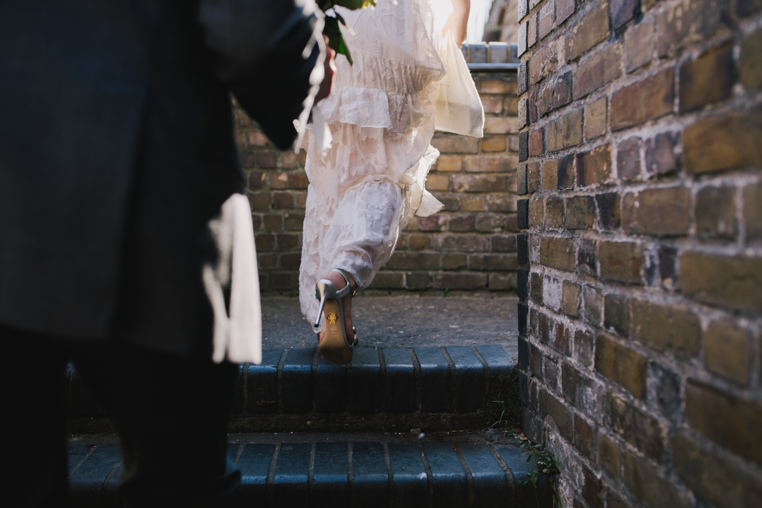 Bride walking to Islington Town Hall Elopement