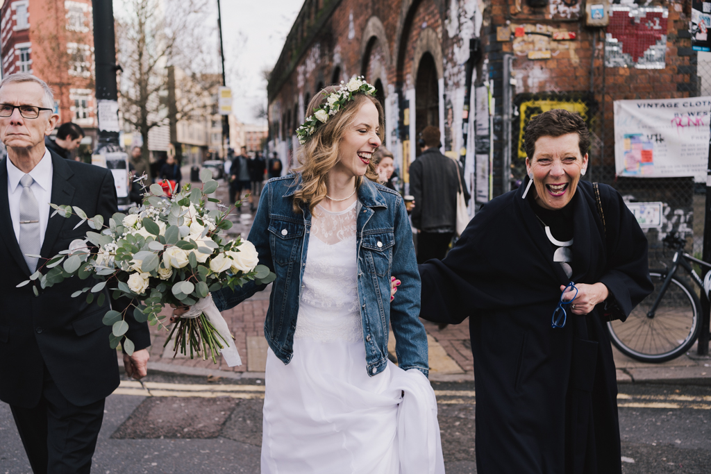 Bride walking through Shoreditch | Shoreditch Studios Wedding | Modern Wedding Photography